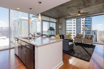 Floor to ceiling windows with 10 to 13 ft ceilings